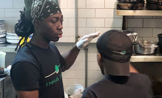 Jose Lopez (left), a trainee chef at Emma’s Torch Restaurant, Brooklyn