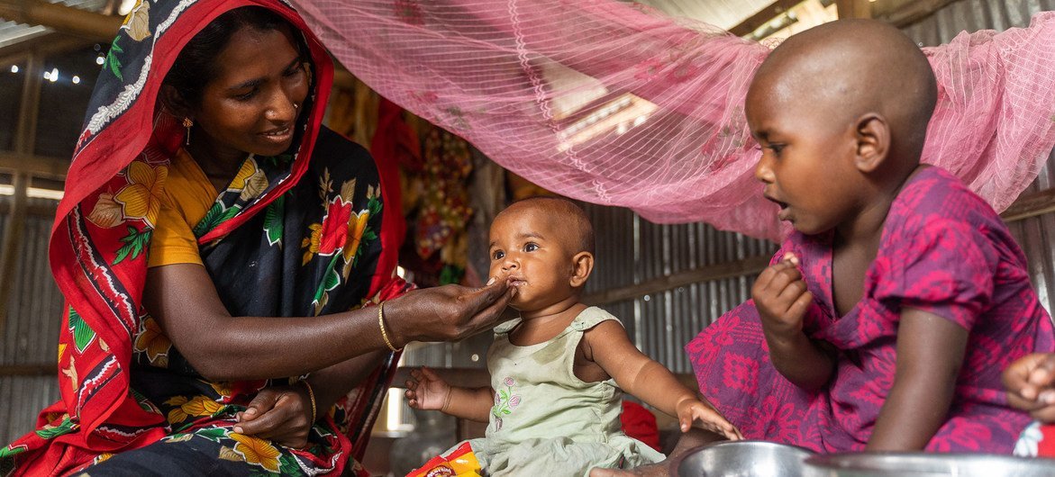 Families are being provided with food aid by the World Food Programme (WFP) after heavy monsoon rains flooded parts of Bangladesh in June 2020.