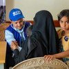 A young child is attended to by an IOM worker in Yemem. IOM are providing lifesaving health care to conflict affected communities, displaced people and migrants in Yemen, while strengthening public health facilities.