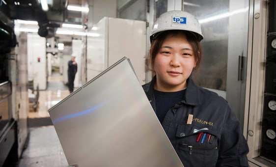 A female employee at a printing factory in Kyoto, Japan.