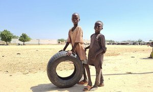 Internally displaced children paly in the Mohammed Goni International Stadium camp in Maiduguri in northeastern Nigeria.