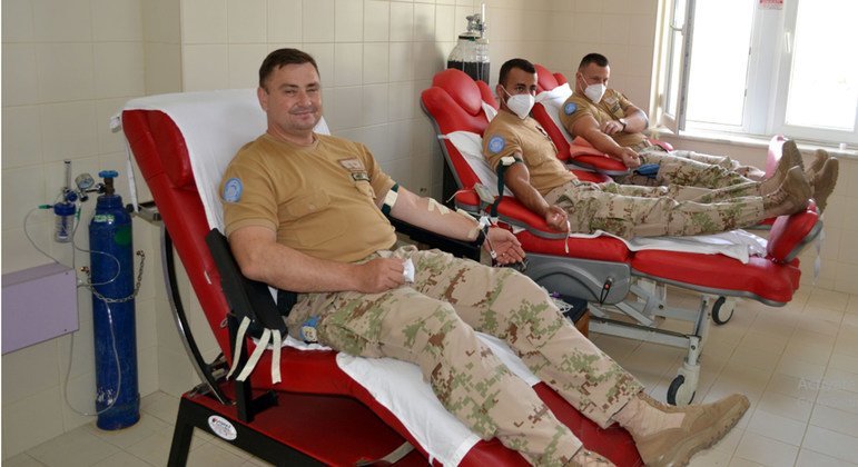 Lt. Col. Ján Hric, Commanding Officer, donates blood with other blue helmets in Sector 4 of the UN Peacekeeping Force in Cyprus (UNFICYP).