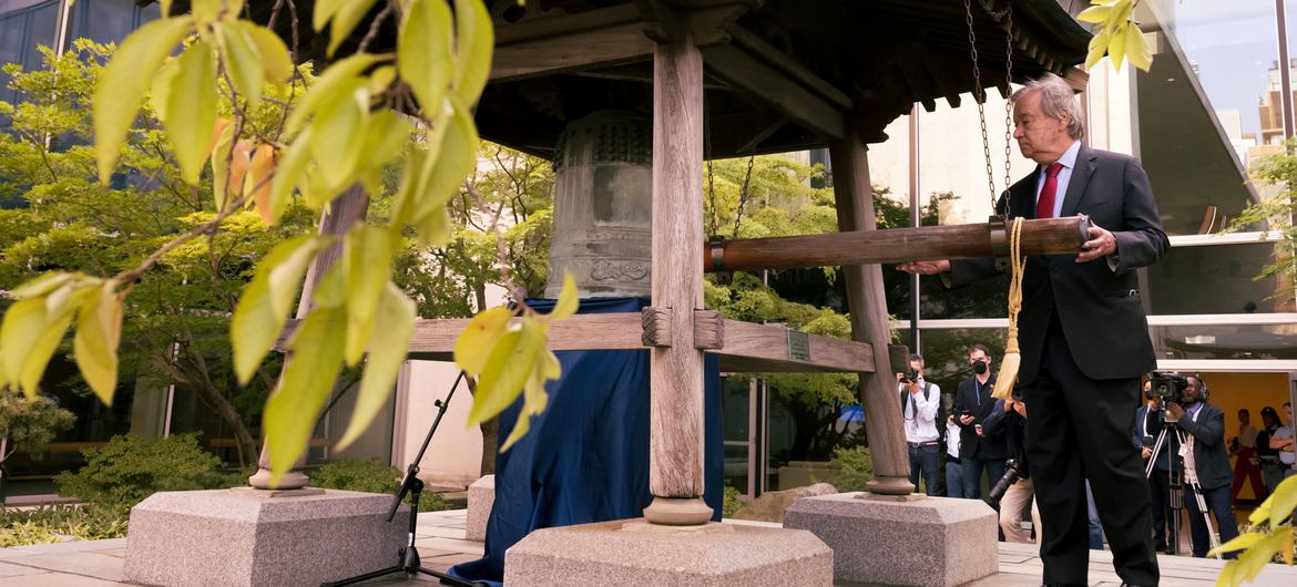 Secretary-General António Guterres rings the Peace Bell during the ceremony held at UN headquarters in observance of the International Day of Peace.