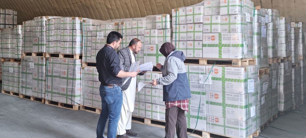 A transportation  of reproductive wellness  kits arrives astatine  a warehouse successful  Kabul, Afghanistan.