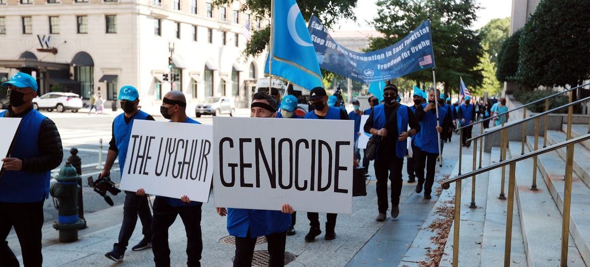 Protesters in Washington, DC, march against the killing of Uyghur Muslims.