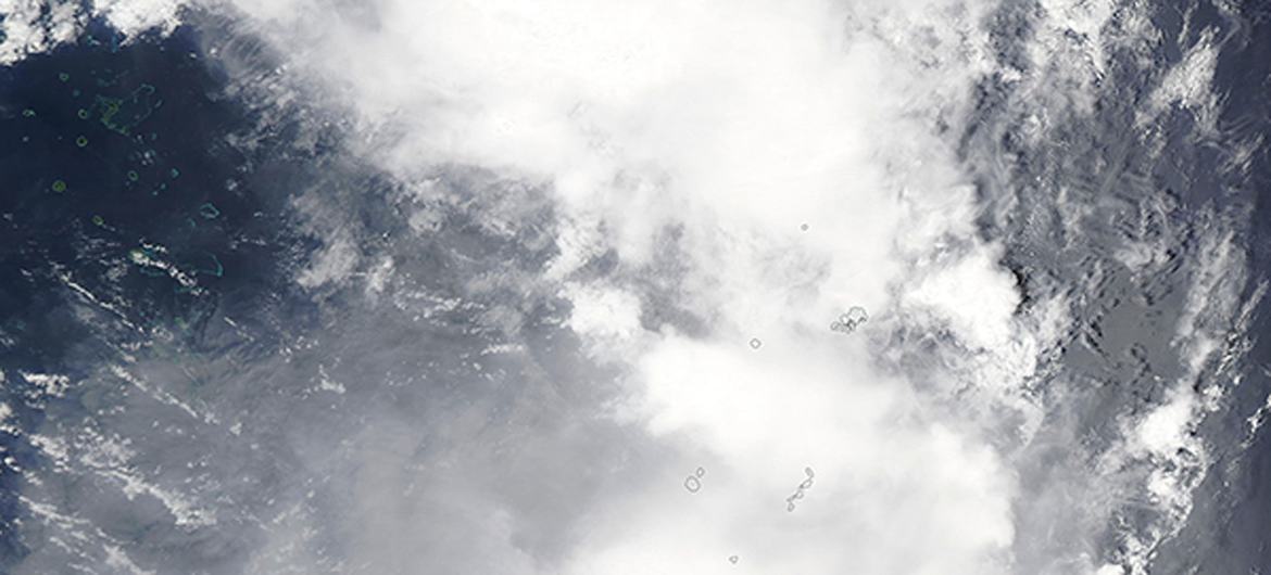The gas, steam, and ash cloud pouring from the Hunga Tonga-Hunga Ha’pai volcano on January 13,  before an eruption.