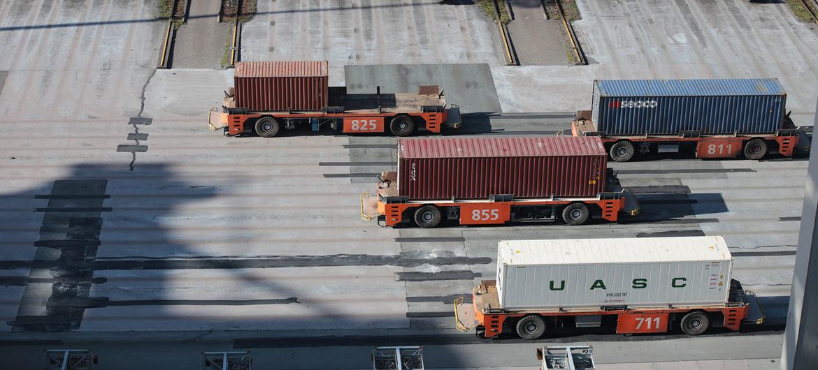 Automated guided vehicles carry shipping containers at a port in Rotterdam in the Netherlands.