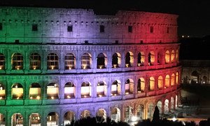 The Colosseum in Rome illuminated in the colours of the Italian flag. Italy is among the latest countries to temporarily suspend AstraZenica COVID vaccine shots (file photo).