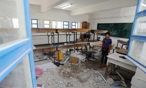 A Palestinian student inspects the damage at a UN school in Gaza. (File)