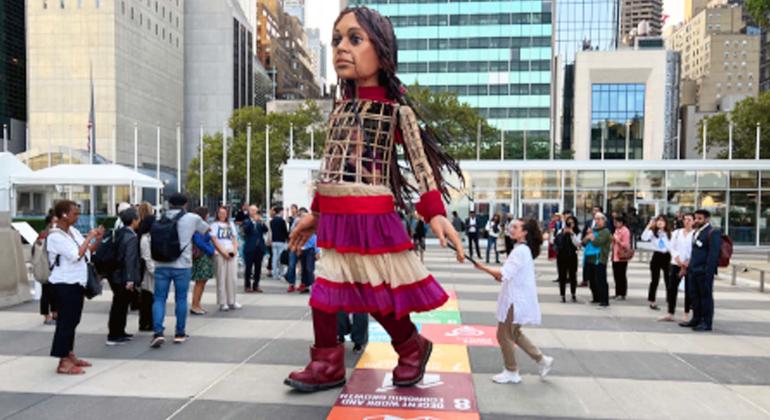 Little Amal, a 12-foot tall doll depicting a 10-year-old Syrian refugee, visits the Transforming Education Summit in New York to remind us that education is a basic right.