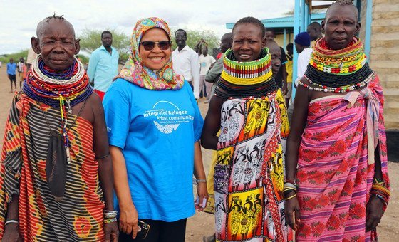 UN-Habitat Executive Director Maimunah Mohd Sharif (2nd left) with women she met during her visit to a new UN-Habitat settlement house in Turkana, Kenya.