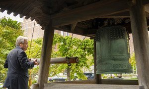 UN Secretary-General António Guterres rings the peace bell at UN Headquarters in New York.