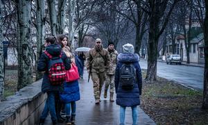 Soldiers and students walk on a street in Krasnohorivka, Donetsk Oblast, Ukraine. (file)