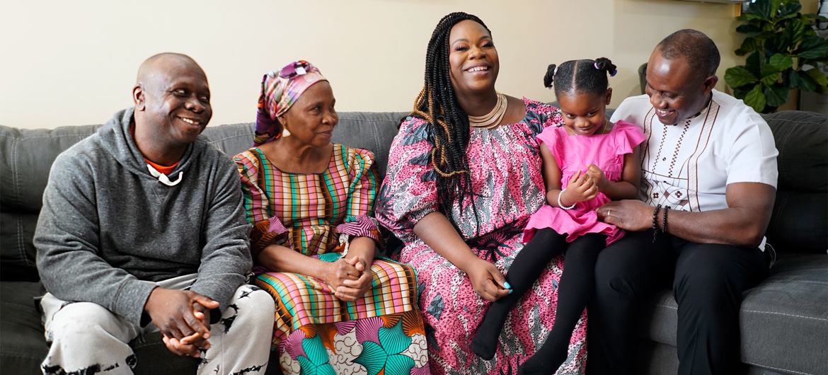 From left to right: Elijah Gboeah, Martha Gboeah, Lourena Gboeah, Moriah Flomo, and Jonah Flomo in their Delaware home, USA.