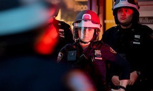 New York City Police Officers look on as protests are under way against racism and police violence after the death of George Floyd.