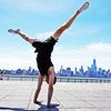 Jon Witt, a yoga teacher, practicing therapeutic yoga postures in Jersey City, USA.