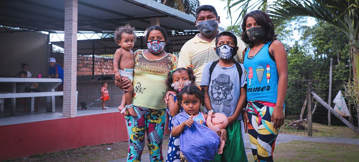 Venezuelan Warao refugee families arrive at a newly opened UN shelter in the Tarumã-Açu neighbourhood of Manaus, northern Brazil.