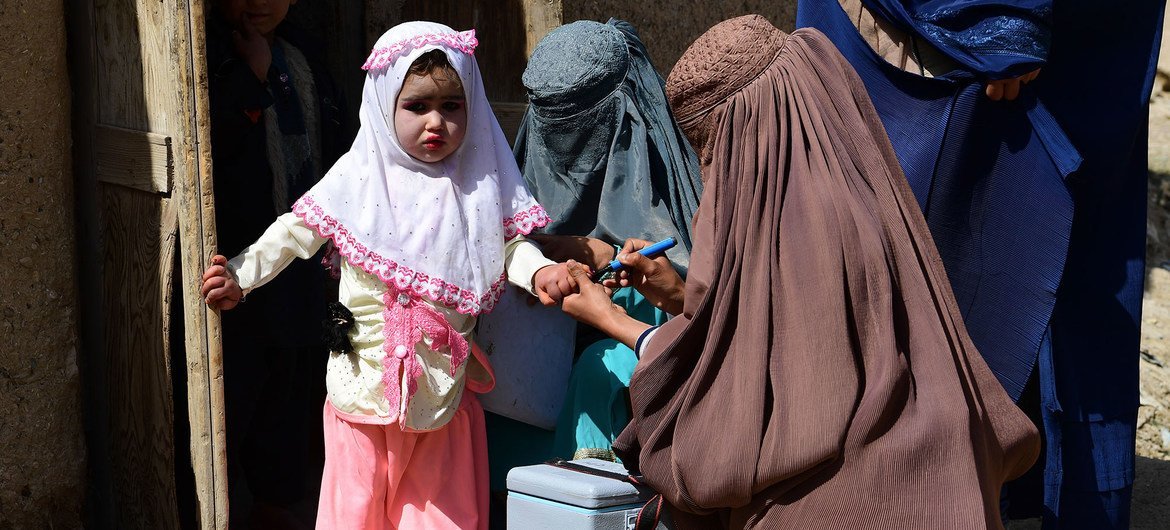 A child is vaccinated against polio in Kandahar, southern Afghanistan.