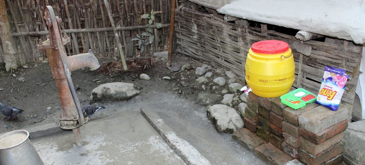 A well with a cement platform and a handwashing station has been built at a house in Belbari’s ward 8.