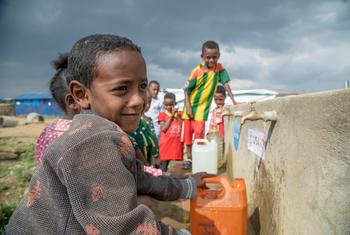 Displaced children collect water in Mekelle, capital of Tigray Region, Ethiopia.