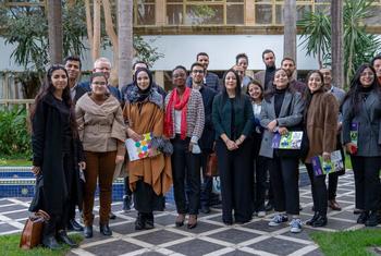 Young Moroccan climate activists and entrepreneurs are taking a group photo with Sylvia Lopez-Ekra in Morocco.