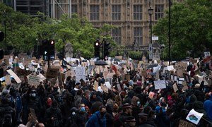 People protest in London in support of Black Lives Matter. June 2020.