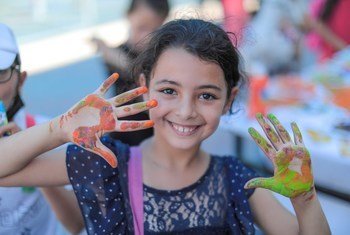 A young girl takes part in UNRWA's Keeping Kids Cool summer activities in Gaza.