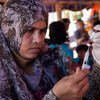 A health worker fills a syringe with vaccine at a Rohingya refugee camp in Cox’s Bazar, Bangladesh.