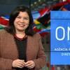 Monica Grayley discursando em um pódio durante uma reunião do Conselho de Segurança da ONU em Nova York.
