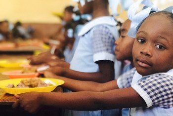 WFP aims to distribute school meals to 300,000 children every day in Haiti, but food deliveries had to be temporarily suspended due to the insecurity.
