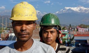 Two workers on a construction site in Pokhara, Nepal.
