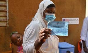 A woman is vaccinated against COVID-19 at a health centre in the Obassin region of Burkina Faso.