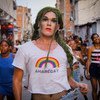 Shout out in the Favela da Maré, in Rio de Janeiro, Brazil.  The t-shirt reads 'Amarégay" -- a pun using the name of the favela, meaning both 'to love is gay' and 'Maré is gay'.