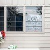 A  sign reads "Love takes courage and determination" at the Linwood Islamic Centre in Christchurch, New Zealand. The Centre was the second of two sites attacked by terrorists on 15 March 2019.