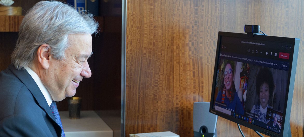 UN Secretary-General António Guterres holds a virtual conversation about climate action with youth activists Paloma Costa from Brazil (left on screen) and Marie Christina Kolo from Madagascar.