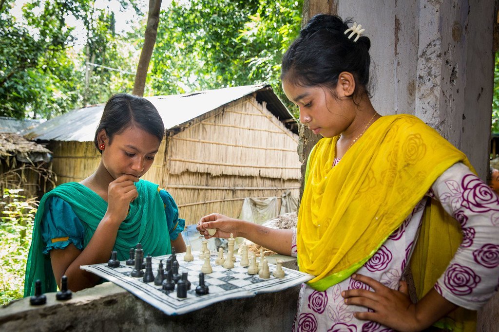 Teenage girls play chess at their club in Jamalpur, Bangladesh..