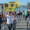 न्यूयॉर्क के एक प्राइमरी स्कूल के छात्र, जलवायु परिवर्तन के मुद्दे पर जुलूस निकालते हुए.