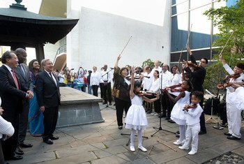 Secretary-General António Guterres (fourth from left) attends the Peace Bell at the annual ceremony held at UN headquarters in observance of the International Day of Peace (20 September 2019).