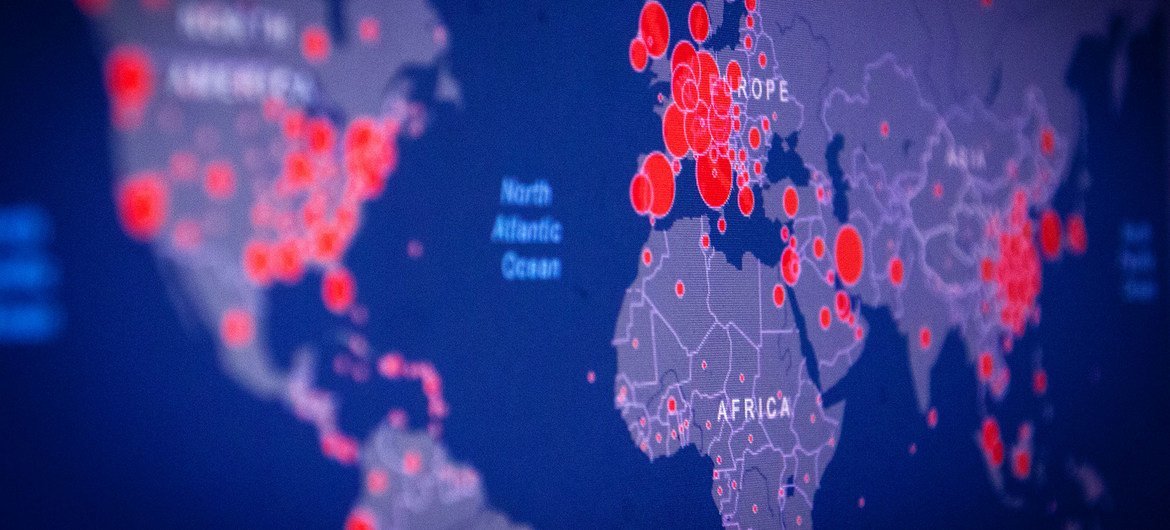 A data map shows the latest coronavirus case load across the world. 