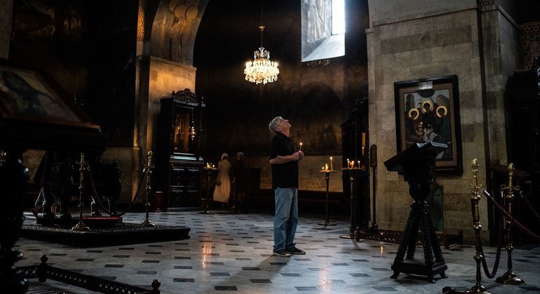 A man prays at Sioni Cathedral in central Tbilisi, Georgia.