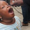 تطعيم الأطفال دون سن الخامسة في سوق سانت ميشيل في كوتونو، بنن