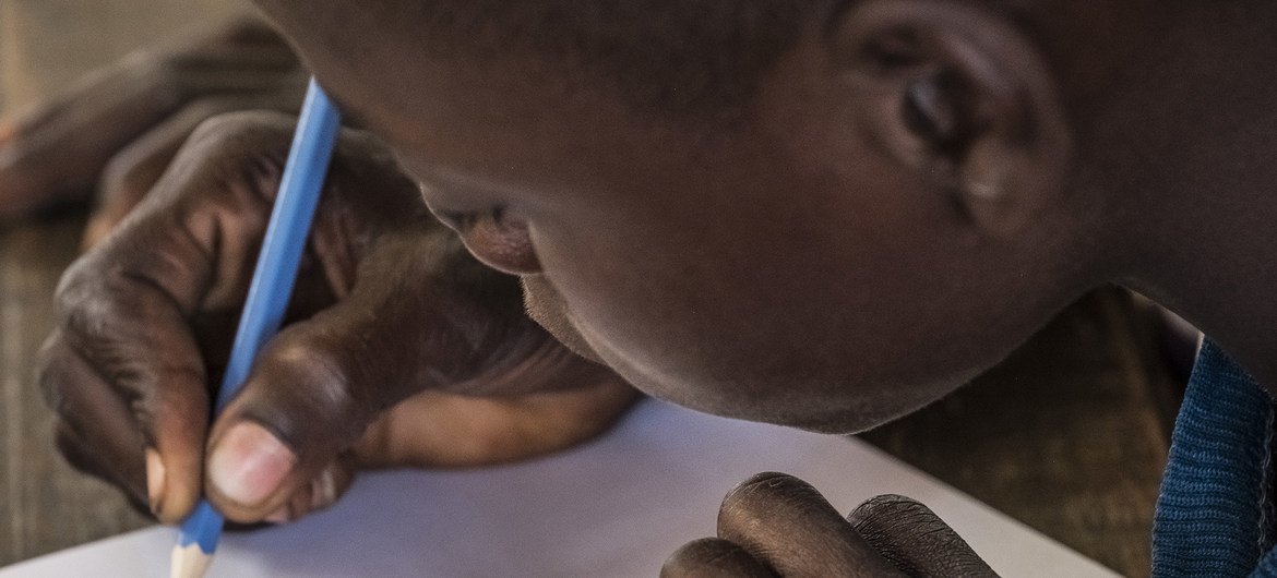 A  14 year-old former child soldier draws at a school in Ndenga village, Kaga Bandoro, Central African Republic. (file)