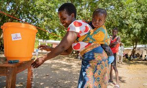 In Muona, Nsanje District (Southern Malawi) beneficiaries are asked to wash hands with soap before and after getting their entitlements.