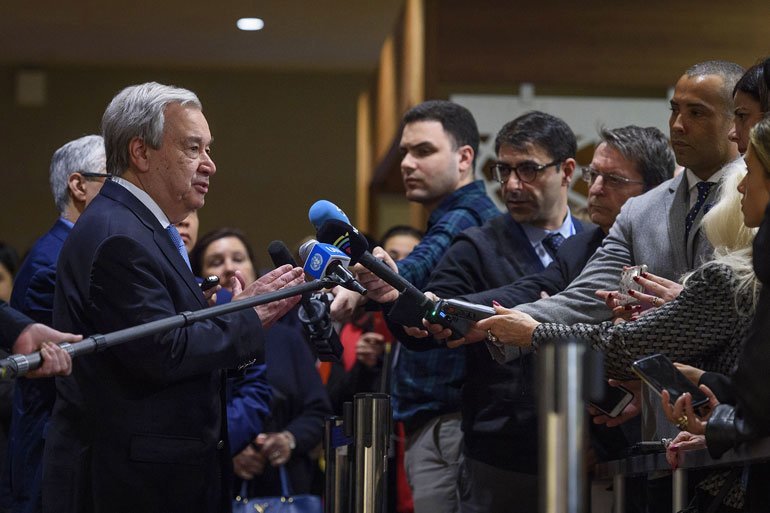 Secretary-General António Guterres (left) briefs reporters on the situation in Libya following UN Security Council consultations.