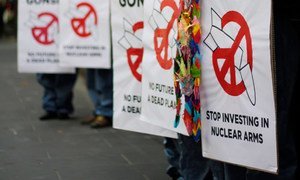 Demonstrators call for a ban on nuclear weapons.