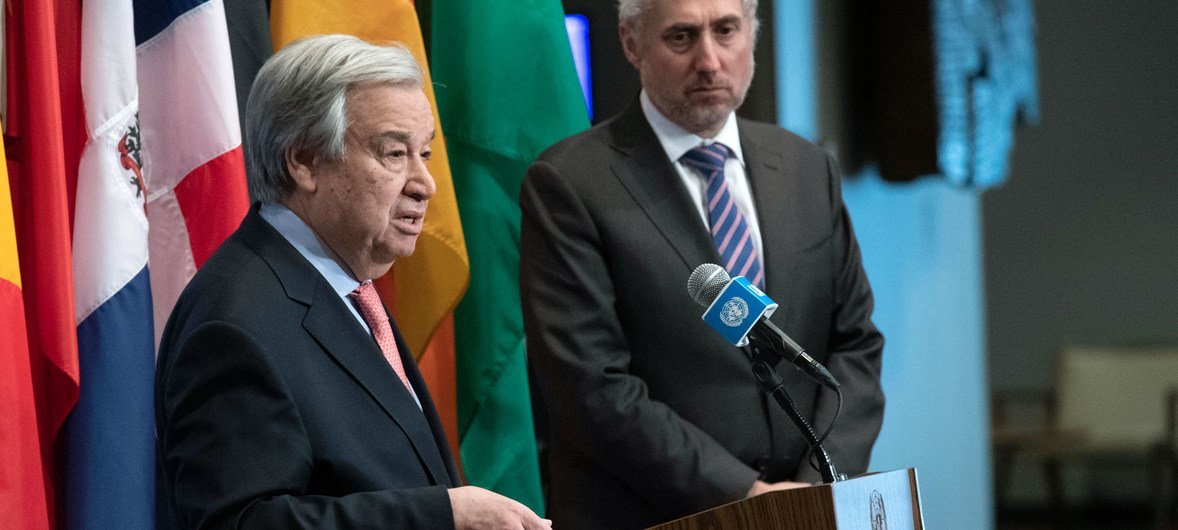 Secretary-General António Guterres briefs reporters at UN Headquarters last February. Alongside him is UN Spokesperson, Stéphane Dujarric (file photo).