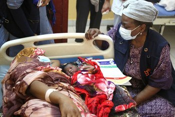 UNFPA Executive Director Natalia Kanem (right) visits a mother and baby at a hospital maternity ward in Sudan’s Blue Nile state.