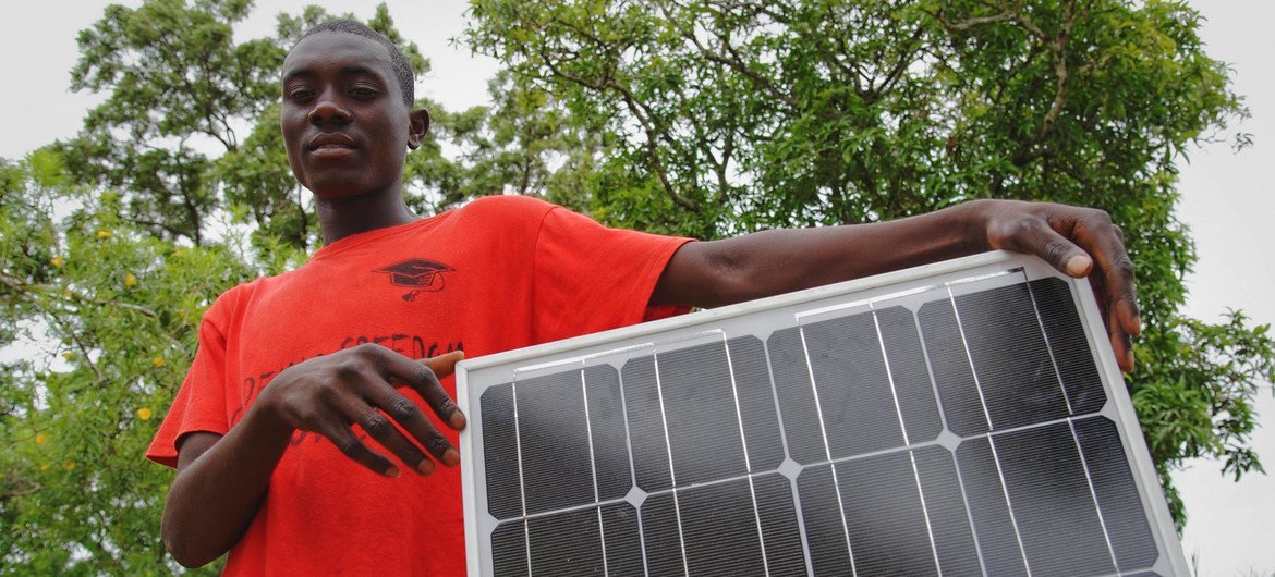A young hairdresser will use the solar panel he received from the International Labour Organisation to power his salon in Malawi.