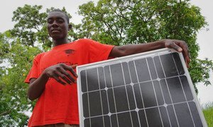 A young hairdresser will use the solar panel he received from the International Labour Organisation to power his salon in Malawi.