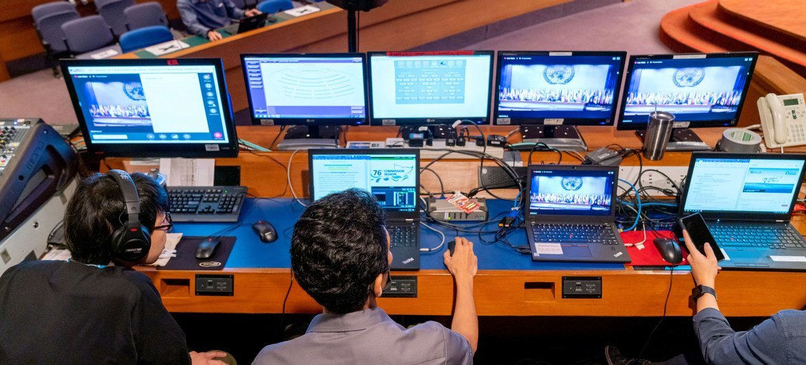 Staff of the control desk monitor proceedings at the 76th session of the Economic and Social Commission for Asia and the Pacific (ESCAP) in Bangkok.
